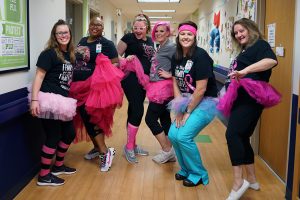 Staff from ChildServe's Transitional Care Unite are showing off their tutu's